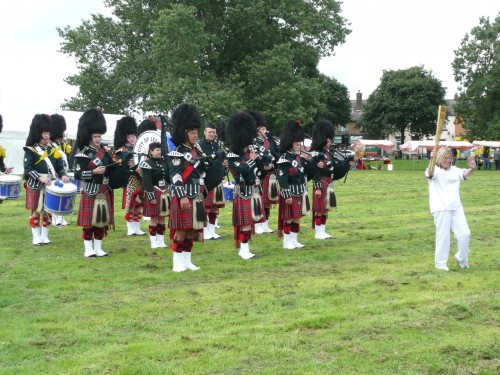 City of Leeds Pipeband at Holbeck Carnival with the Olympic Torch